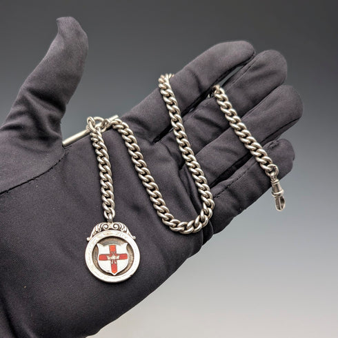 Circa 1900 British antique sterling silver Albert chain, 42g, enamel decoration, sterling silver medal fob