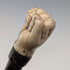 Antique British bone fist-shaped round handle walking stick, 85cm