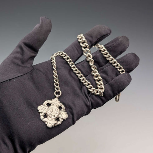 Circa 1890 British antique sterling silver Albert chain, 65g sterling silver medal fob