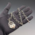 Circa 1900 British antique sterling silver Albert chain, 52g, sterling silver medal fob