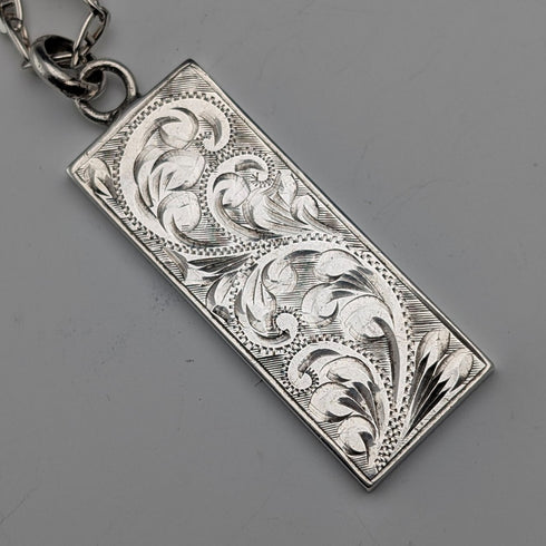 1977 British sterling silver jubilee ingot pendant and sterling silver chain, total weight 22g, WJ Co.