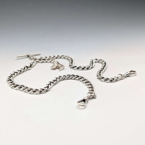 Circa 1900 British antique sterling silver double Albert chain 54g horse head fob