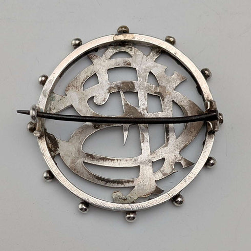 Antique sterling silver monogrammed round brooch