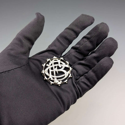 Antique sterling silver monogrammed round brooch