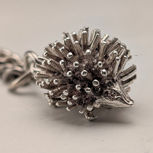 1912 British antique sterling silver Albert chain 50g hedgehog fob
