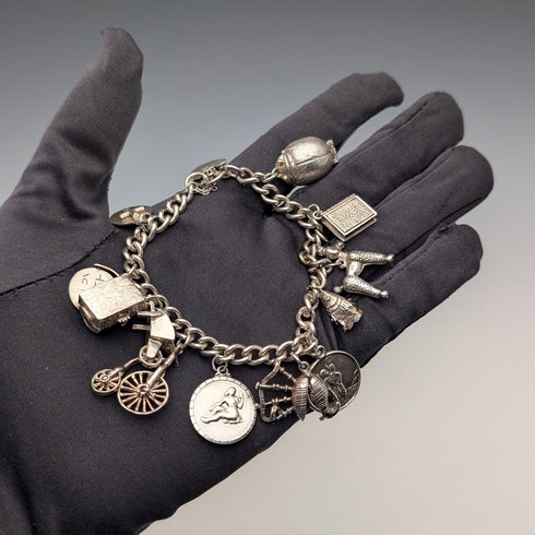 1962年 英国ヴィンテージ 純銀製 チャームブレスレット 48g 南京錠型留め金 WJS