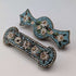 Pair of vintage micro-mosaic brooches with floral embellishment