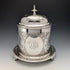 Antique British silver plated biscuit barrel with bird decoration
