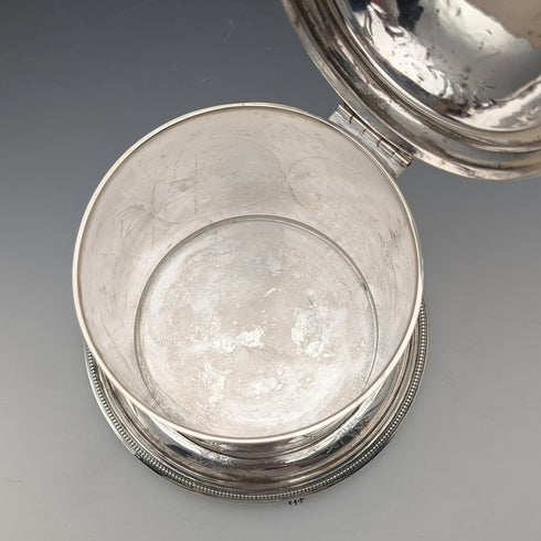 Antique British silver plated biscuit barrel with bird decoration