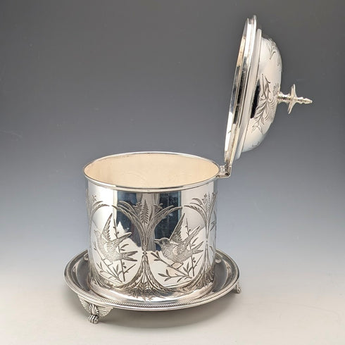 Antique British silver plated biscuit barrel with bird decoration