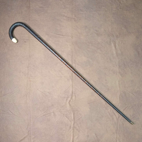 Antique British bone decorated curved handle leather wrapped iron shaft walking stick 89cm