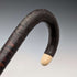 Antique British bone decorated curved handle leather wrapped iron shaft walking stick 89cm