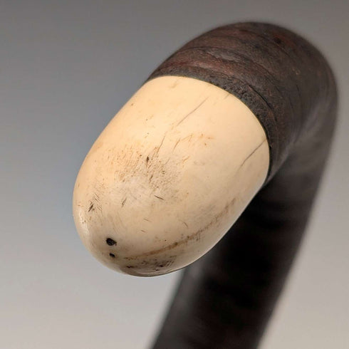 Antique British bone decorated curved handle leather wrapped iron shaft walking stick 89cm