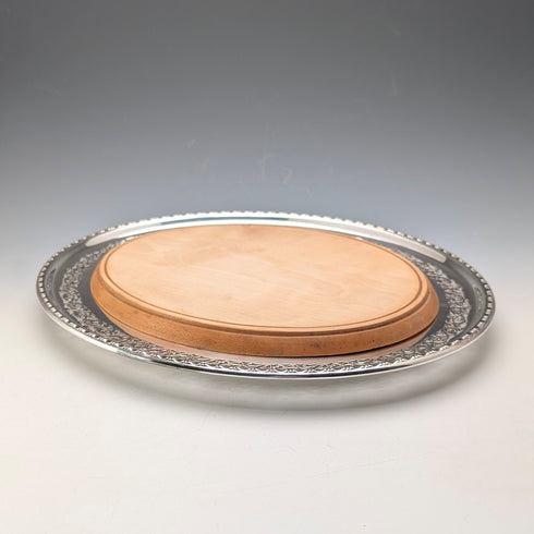 Antique British silver plated oval breadboard by Briddon Brothers