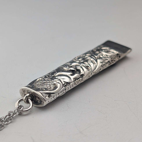1902 British antique floral decorated sterling silver whistle by William Manton, with chain
