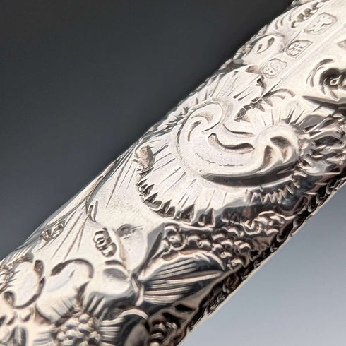 1902 British antique floral decorated sterling silver whistle by William Manton, with chain