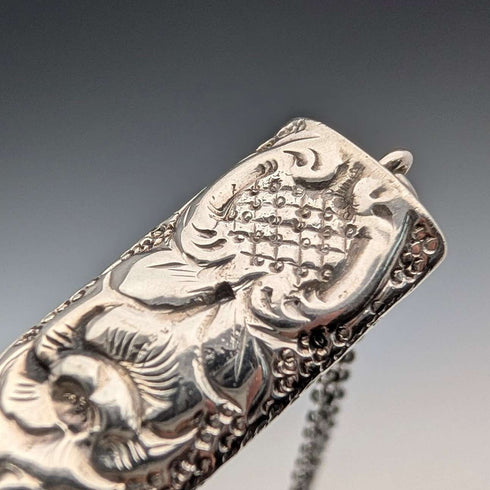 1902 British antique floral decorated sterling silver whistle by William Manton, with chain