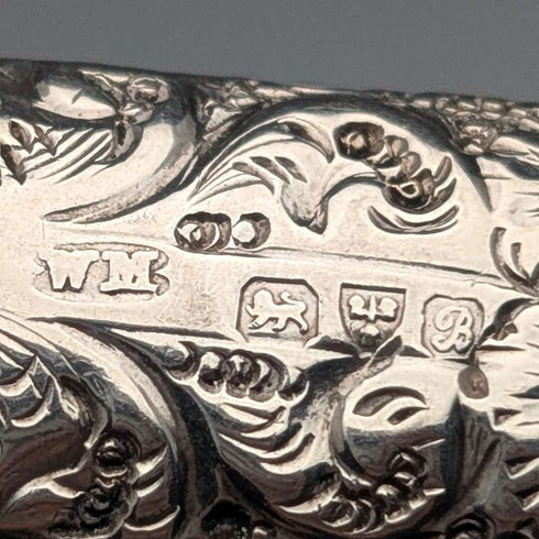 1902 British antique floral decorated sterling silver whistle by William Manton, with chain