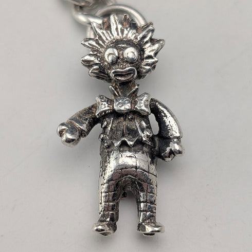 Circa 1900 British antique sterling silver long Albert chain 48g clown charm fob