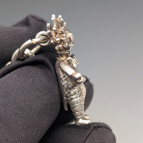 Circa 1900 British antique sterling silver long Albert chain 48g clown charm fob
