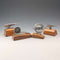 4 vintage Fender mascots with wooden stands