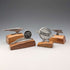 4 vintage Fender mascots with wooden stands