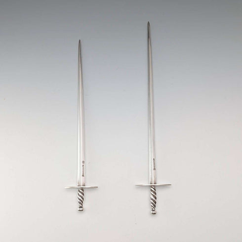 Antique British silver plate sword-shaped meat skewers pair by William Hutton & Sons