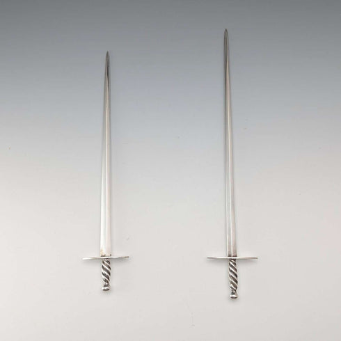 Antique British silver plate sword-shaped meat skewers pair by William Hutton & Sons