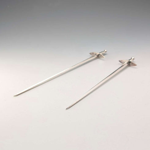 Antique British silver plate sword-shaped meat skewers pair by William Hutton & Sons