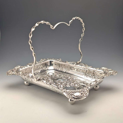 Antique British late Victorian silver plate basket with adjustable handle