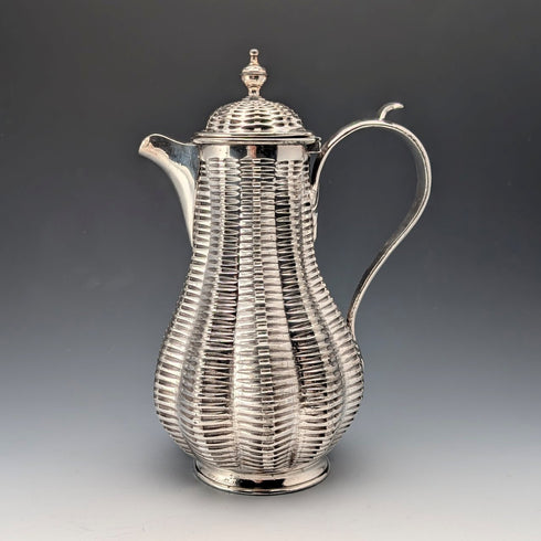 Antique British silver plate water jug decorated with woven rattan pattern