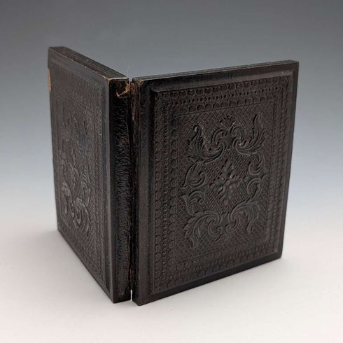 British antique, Ambrotype photograph of a man, housed in a leather case.