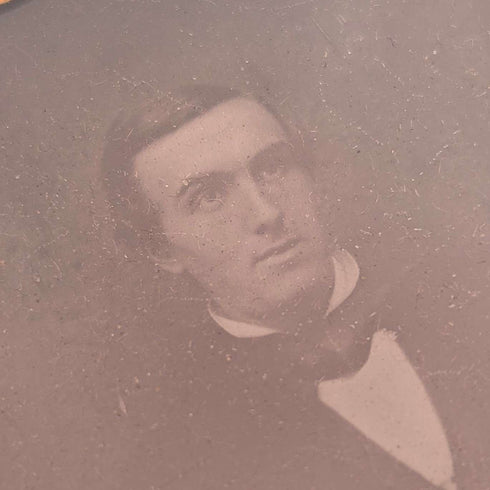 British antique, Ambrotype photograph of a man, housed in a leather case.