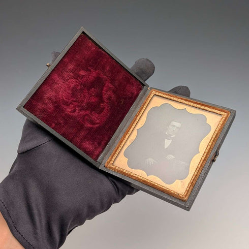 British antique, Ambrotype photograph of a man, housed in a leather case.