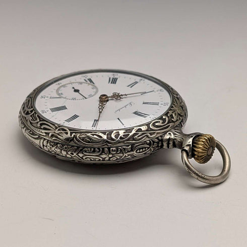 19th century antique LABRADOR (Omega) pocket watch with relief engraving, open face, in good working condition