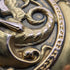 Zenith pocket watch, circa 1913, with dragon relief carving, 18k gold hunter case, in good working order.
