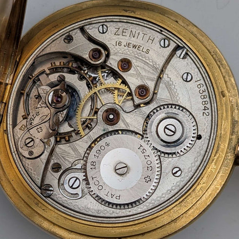 Zenith pocket watch, circa 1913, with dragon relief carving, 18k gold hunter case, in good working order.