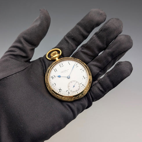1919 Waltham Traveler pocket watch with gold-plated case, mechanical movement, in good working order.