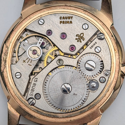 1950s Swiss Cauny men's wristwatch, 15 jewels, gold-plated case, in good working order
