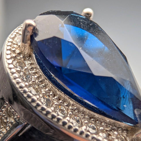 Vintage sterling silver drop-shaped blue cubic zirconia ring (size 12)