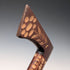 Vintage brown shaft walking stick with carved wood accents and an axe-shaped handle, 85cm