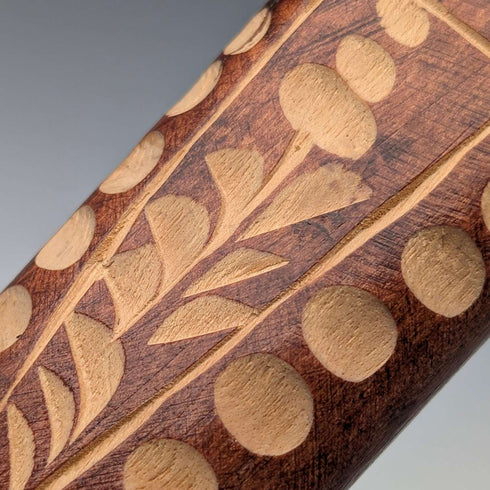 Vintage brown shaft walking stick with carved wood accents and an axe-shaped handle, 85cm