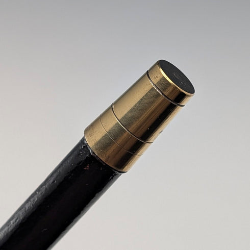 British antique black shaft sterling silver plain rondelle handle walking stick, 87cm