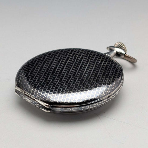 Antique, unsigned, Swiss-made pocket watch with silver case, niello decoration, open face, in good working order.
