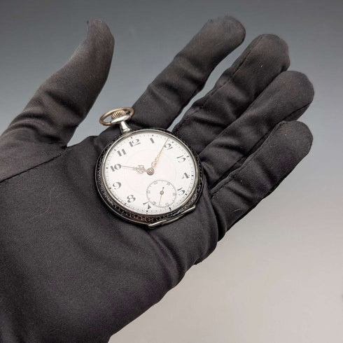 Antique, unsigned, Swiss-made pocket watch with silver case, niello decoration, open face, in good working order.