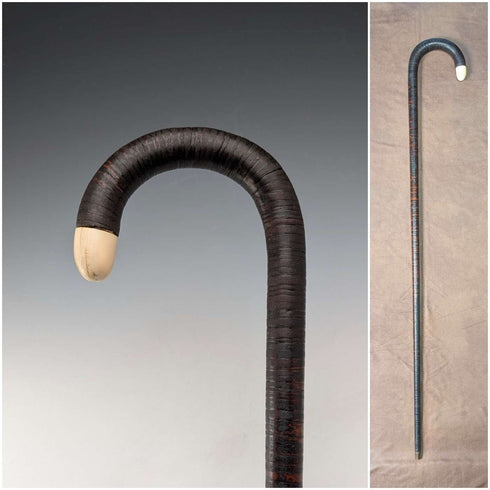 Antique British bone decorated curved handle leather wrapped iron shaft walking stick 89cm