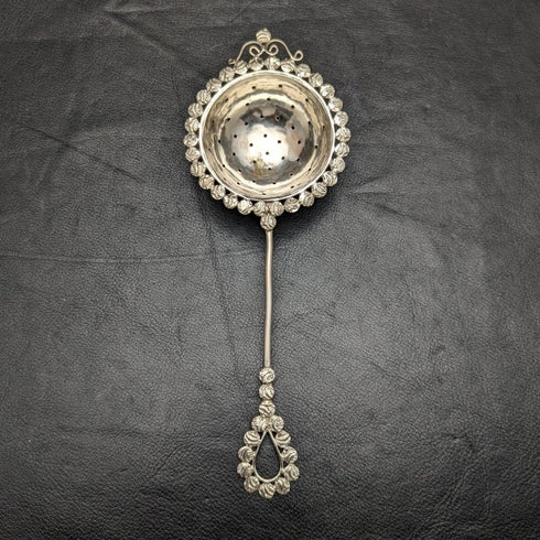 Vintage silver-plated tea strainer