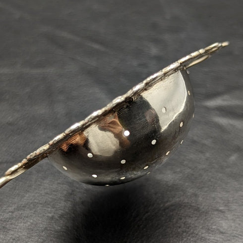 Vintage silver-plated tea strainer