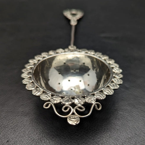 Vintage silver-plated tea strainer