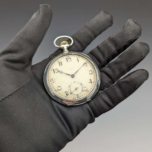 Antique Swiss-made pocket watch with engraved silver side, open face, paper dial, working condition